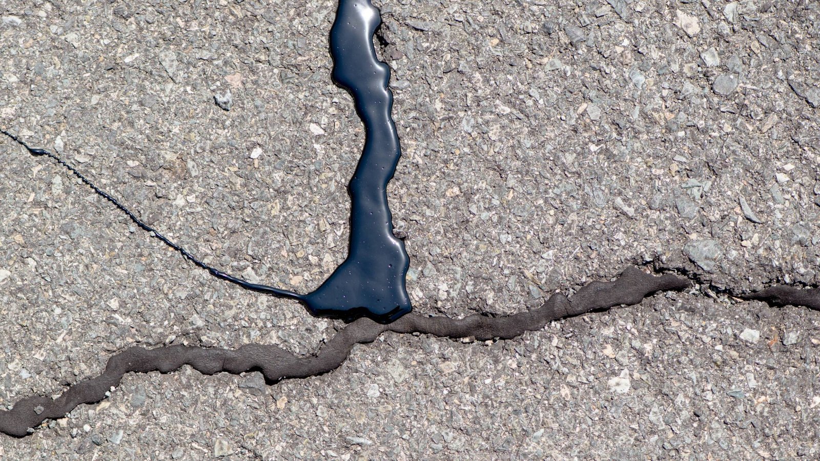 New tar poured next to old tar